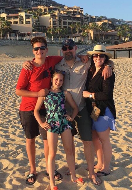 Melissa with her family on vacation in Cabo San Lucas